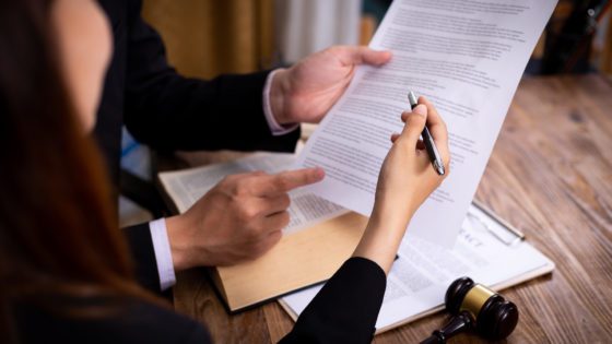 Two people reviewing paperwork.