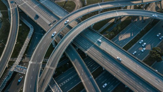 Aerial view of multiple lane highway and overpasses.