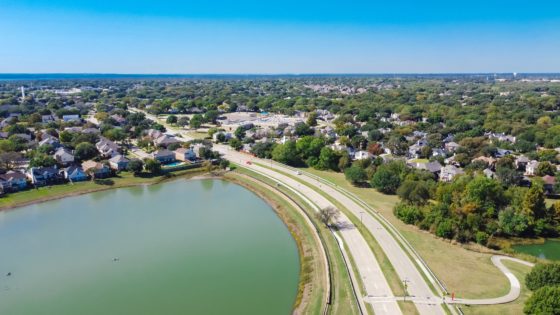Aerial,View,Residential,Neighborhood,With,Grapevine,Lake,In,Horizontal,Line.